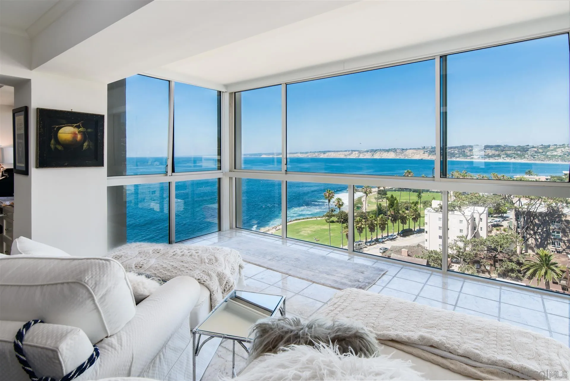 939 Coast Boulevard, Unit 16F La Jolla, CA 92037 - Photo 5 of 22 a bedroom with a large bed and a large window