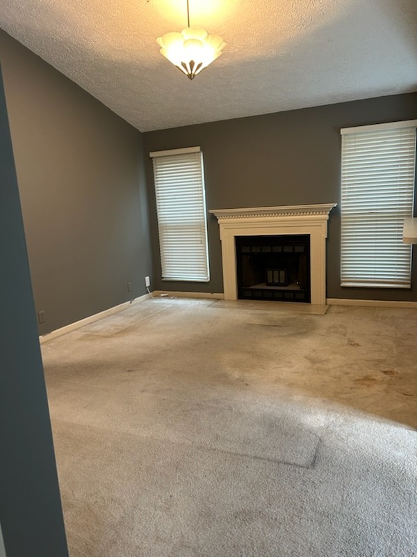 2107 Apollo Drive Franklin, TN 37069 - Photo 6 of 9 a view of empty room with a fireplace