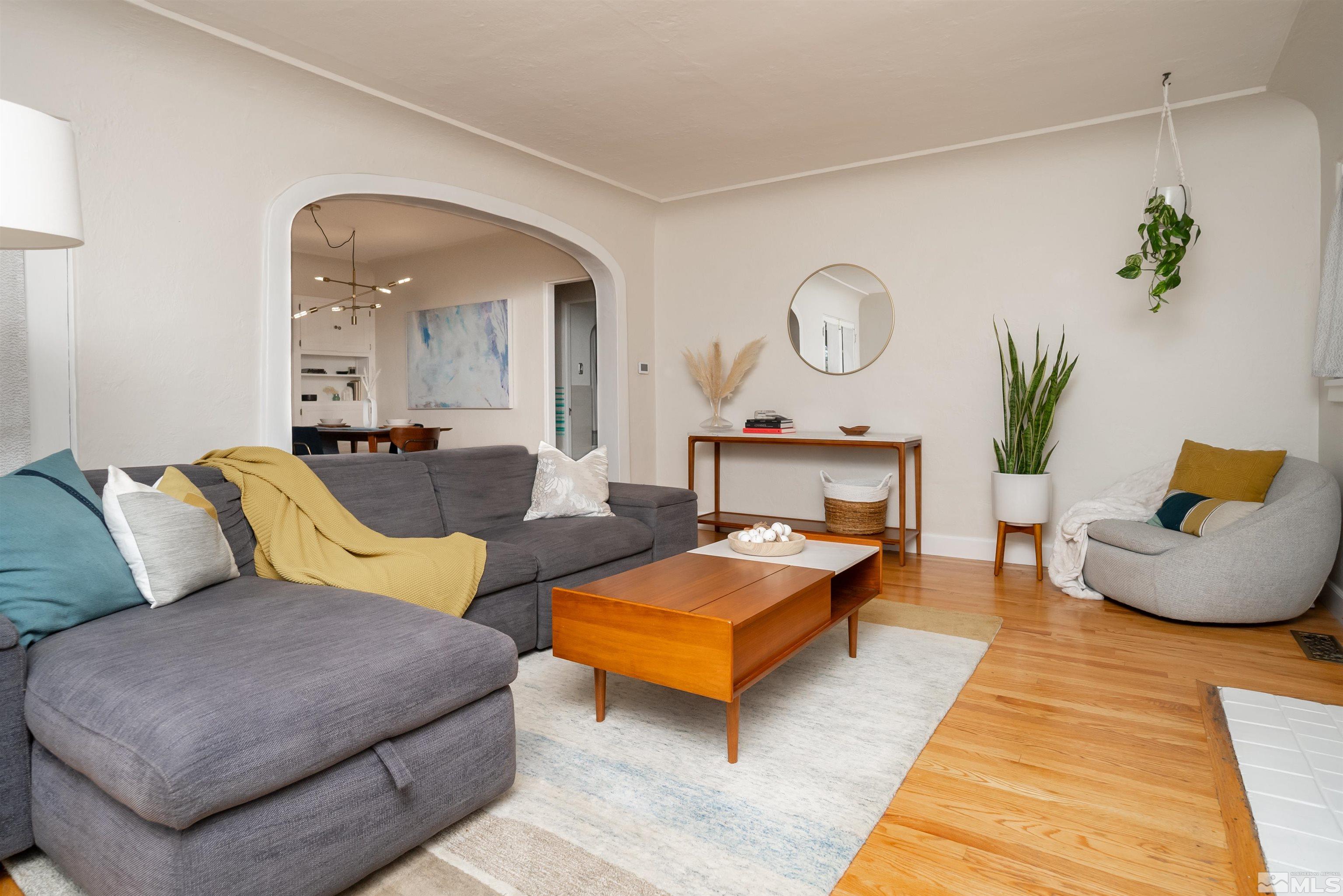 1405 Haskell Street Reno, NV 89509 - Photo 5 of 40 a living room with furniture a rug and white walls