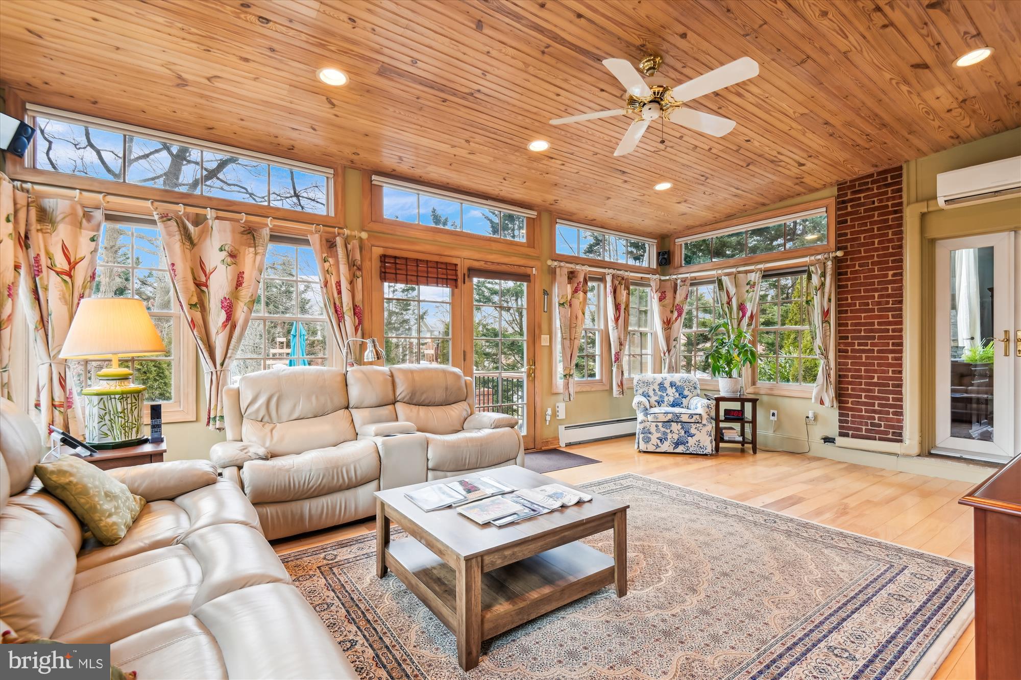 4220 North Charles Street Baltimore, MD 21218 - Photo 11 of 30 a living room with furniture and large windows