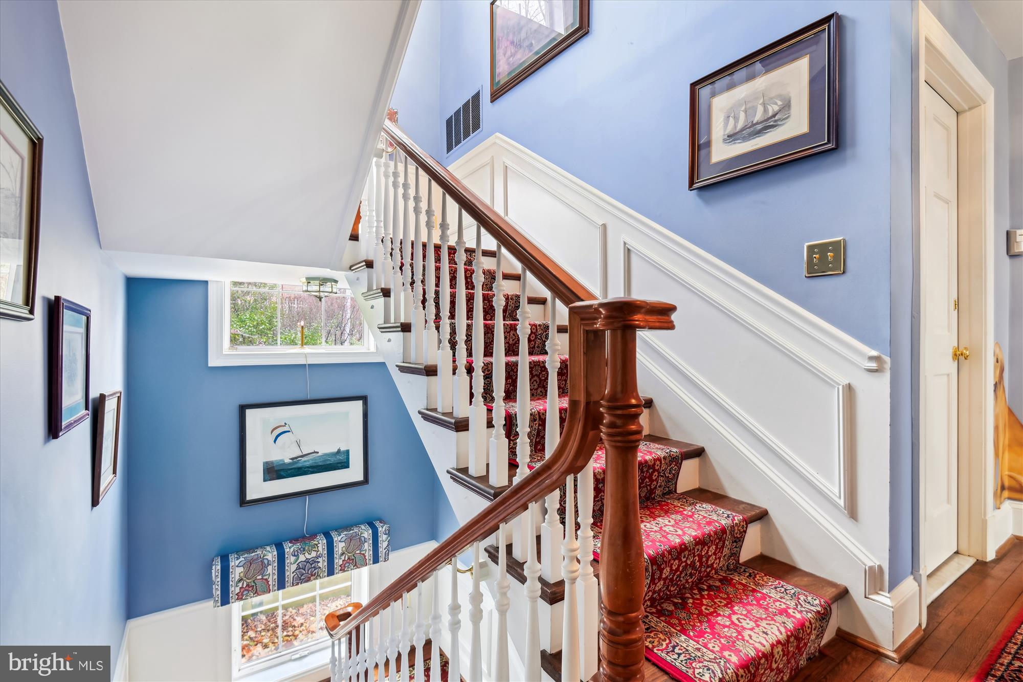4220 North Charles Street Baltimore, MD 21218 - Photo 17 of 30 a view of entryway with stairs and wooden floor