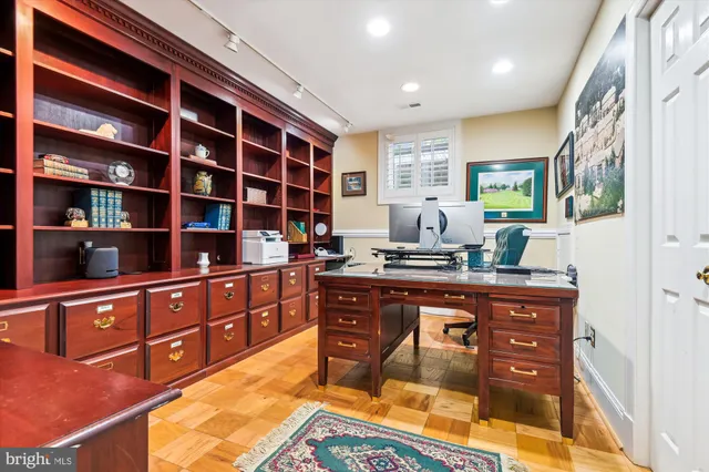 a kitchen with stainless steel appliances granite countertop a sink and wooden cabinets