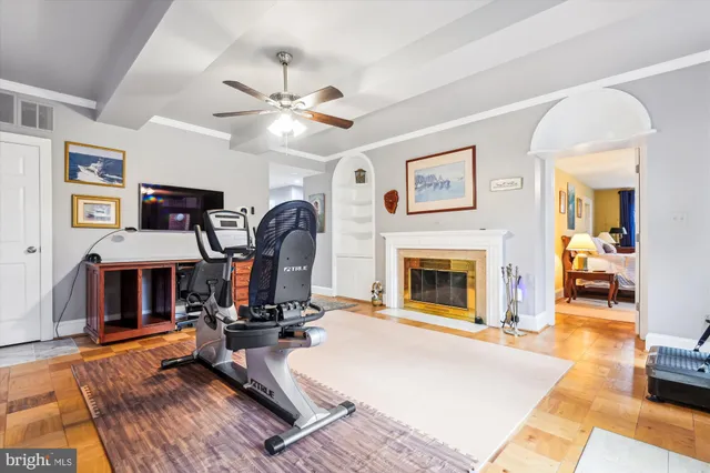 a view of a livingroom with furniture and a fireplace
