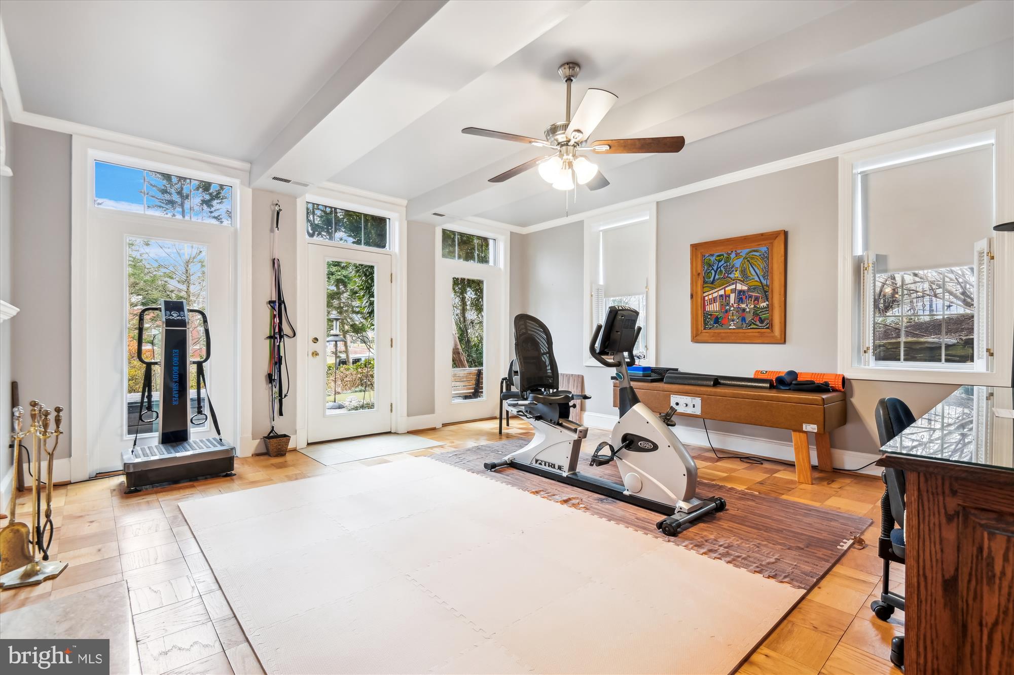 4220 North Charles Street Baltimore, MD 21218 - Photo 26 of 30 a living room with furniture a flat screen tv and a large window