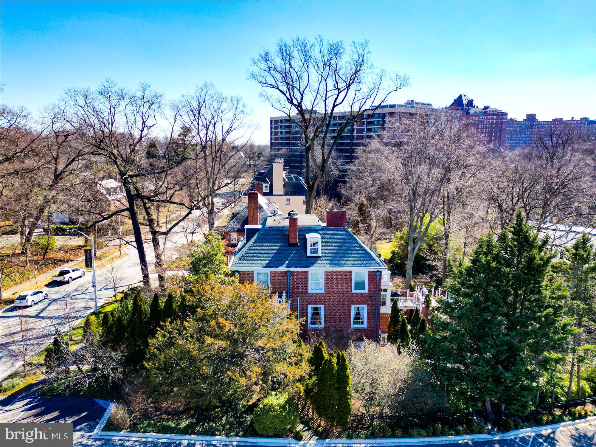 4220 North Charles Street Baltimore, MD 21218 - Photo 29 of 30 a front view of a house with yard and trees