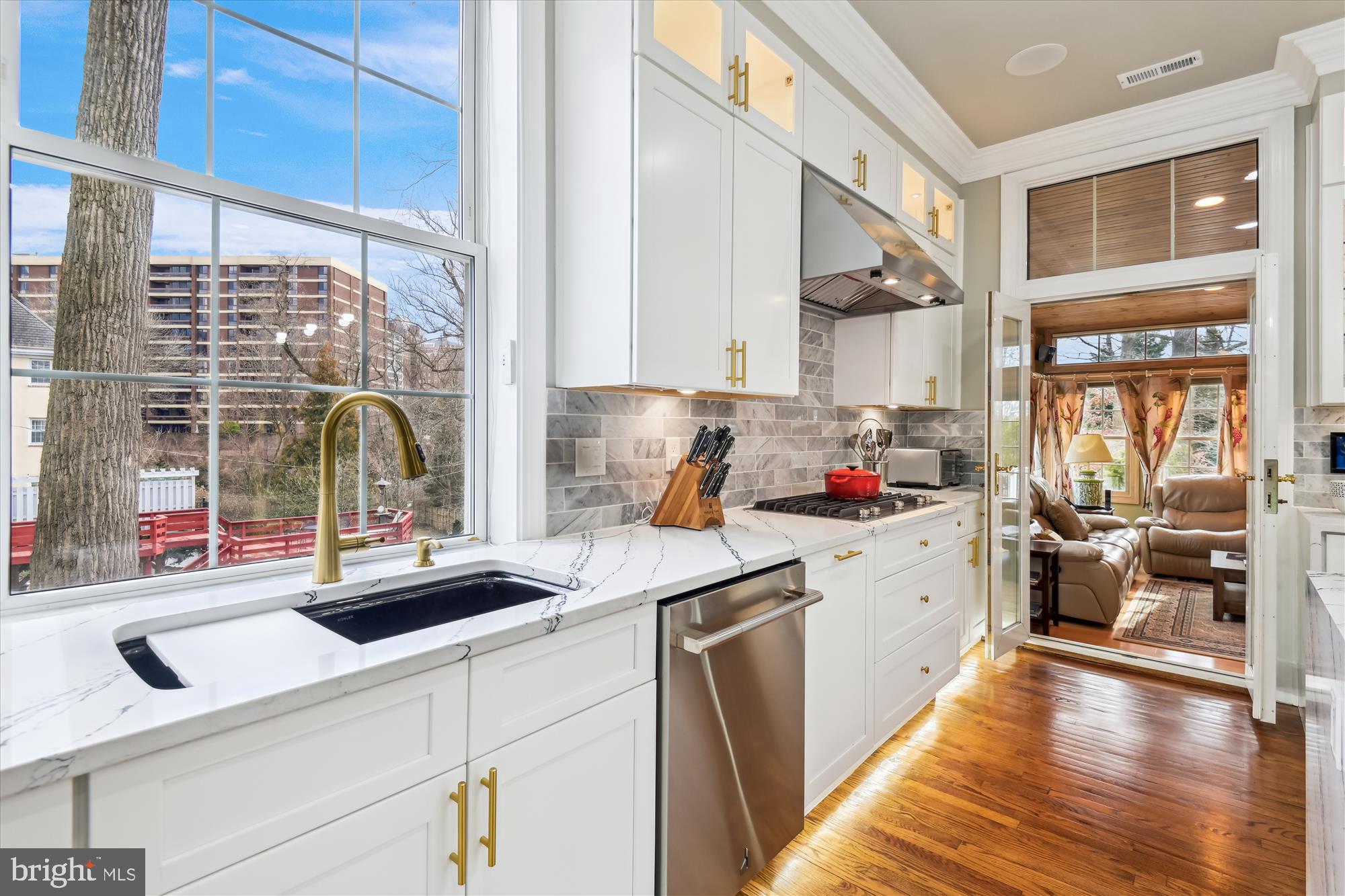 4220 North Charles Street Baltimore, MD 21218 - Photo 7 of 30 a kitchen that has a sink and a stove in it
