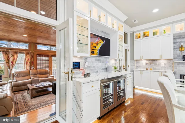 a kitchen with a stove a sink and a refrigerator