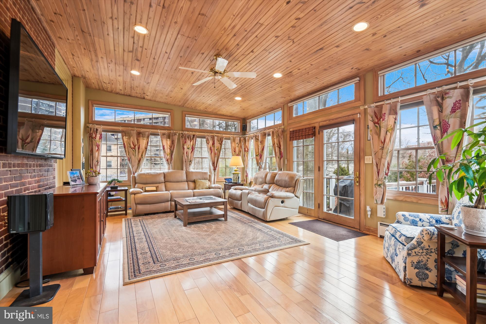 4220 North Charles Street Baltimore, MD 21218 - Photo 10 of 30 a living room with furniture and a large window