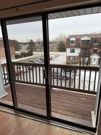 a view of a balcony with city view