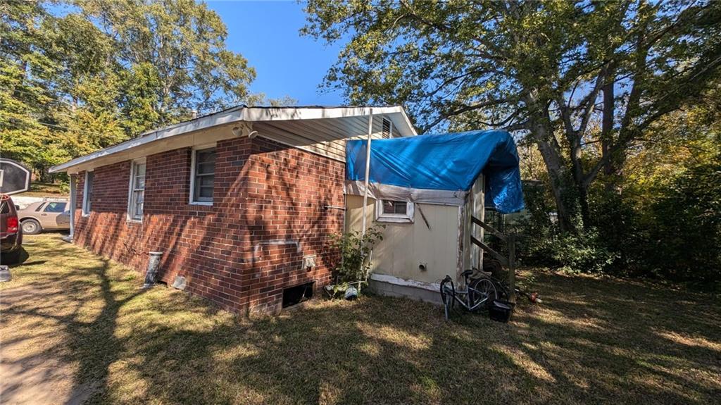 646 Straight Street Macon, GA 31204 - Photo 2 of 12 a view of backyard with deck and outdoor seating