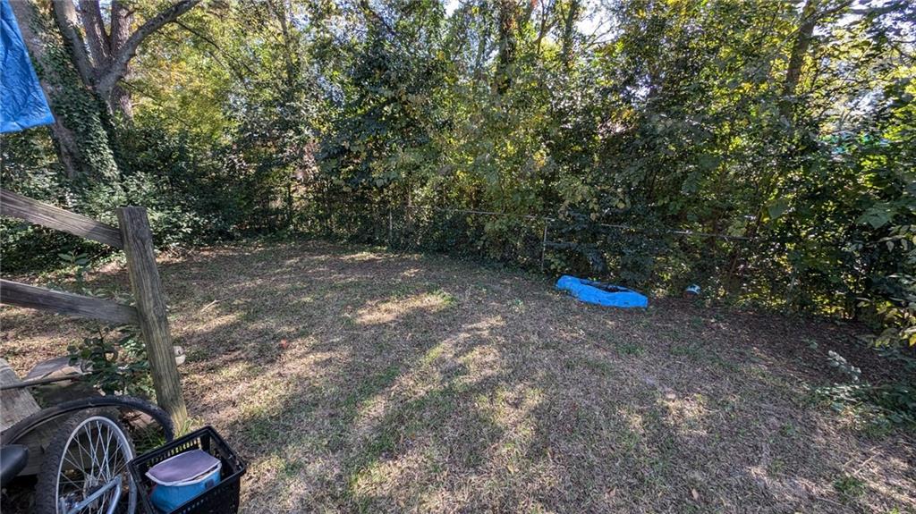 646 Straight Street Macon, GA 31204 - Photo 4 of 12 a view of outdoor space with deck and tree