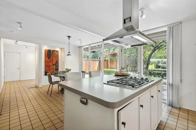 a view of kitchen island with furniture and window