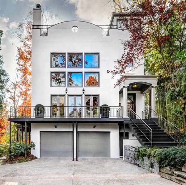 a view of a building with a window and garage