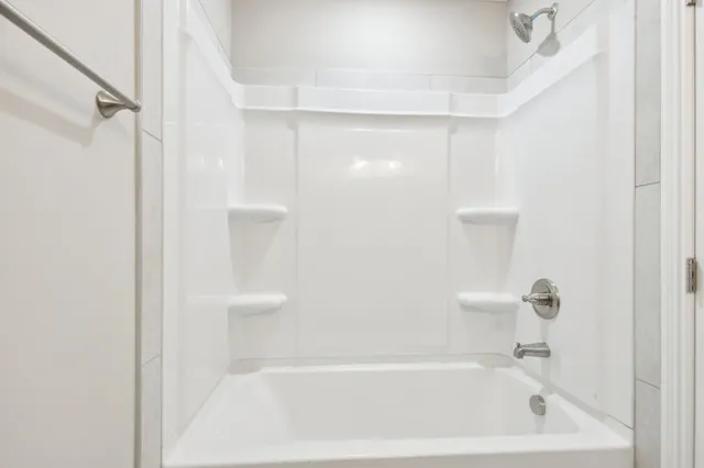 a bathroom with a bathtub