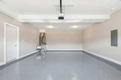 a view of an empty room with windows