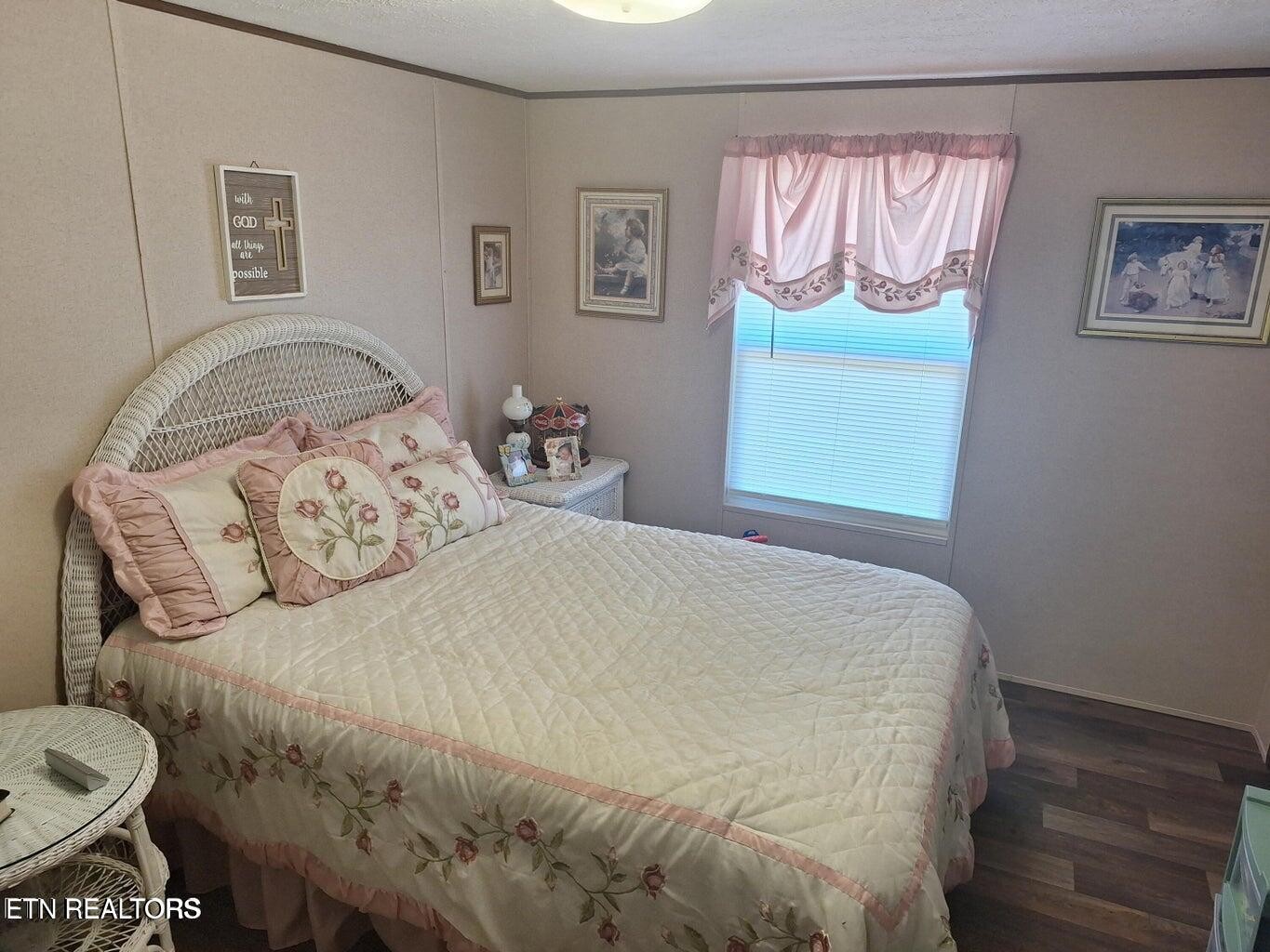 1450 Belltown Road Tellico Plains, TN 37385 - Photo 21 of 32 a bedroom with a bed and a window
