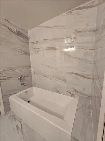 a bathroom with a bathtub