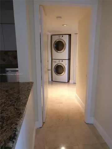 a view of a storage & utility room with washer and dryer