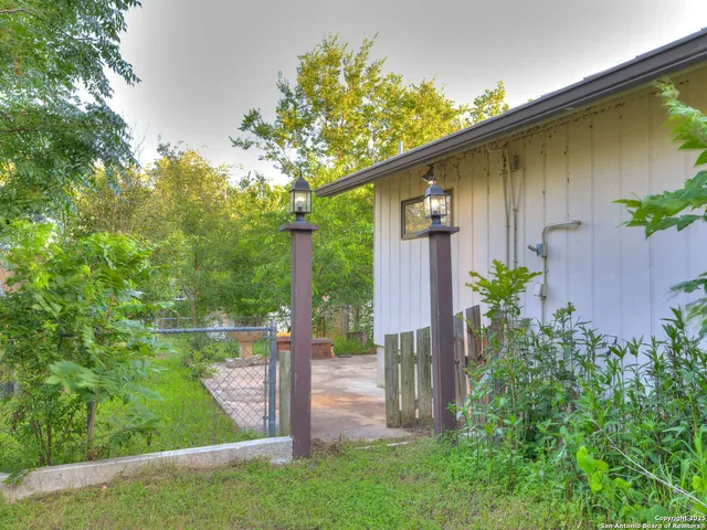 a view of a hallway with bathroom