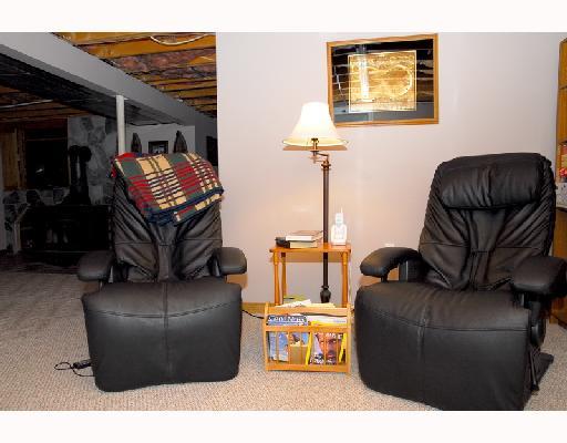 535 Waltz Ml Road Ruffs Dale, PA 15679 - Photo 7 of 8 Den/Family/Great Room. Lower Level, Family Room, WoodBurner Sove, Partially Finished, Add Your Own Final Touches
