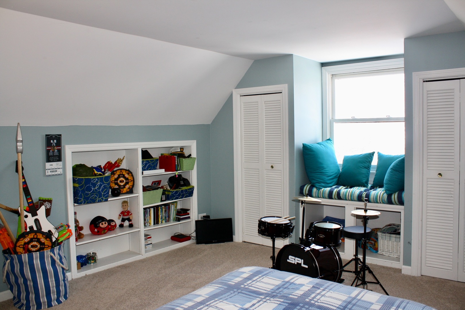 321 North Wright Street Naperville, IL 60540 - Photo 13 of 23 a living room with lots of furniture and a flat screen tv