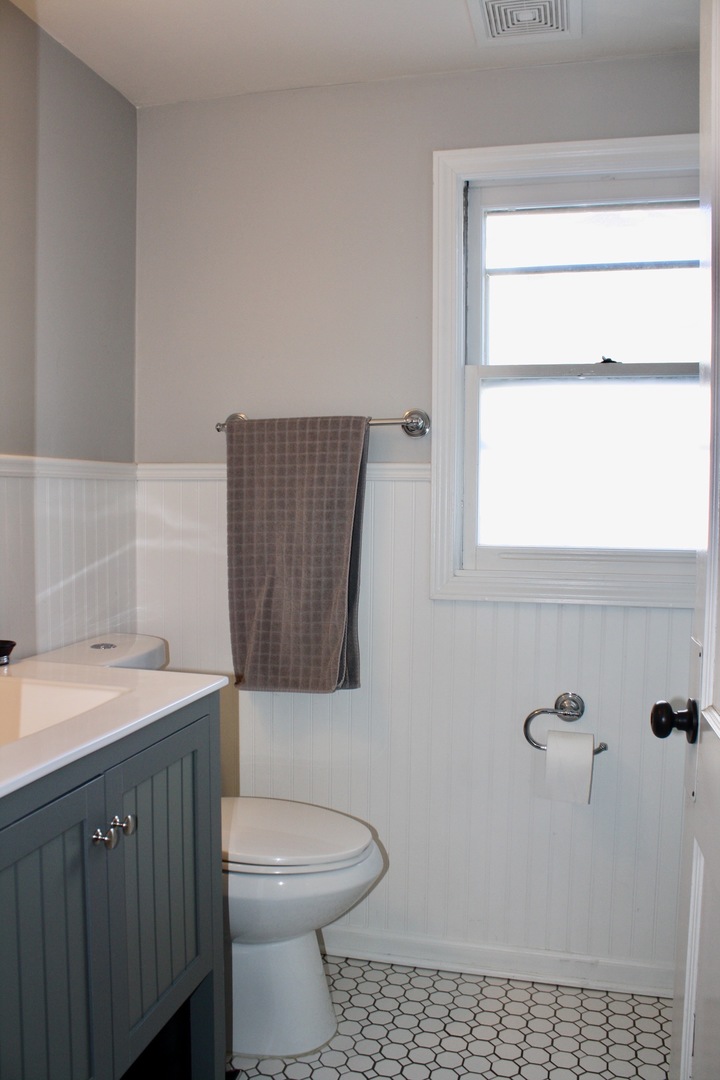 321 North Wright Street Naperville, IL 60540 - Photo 15 of 23 a bathroom with a sink a toilet and shower