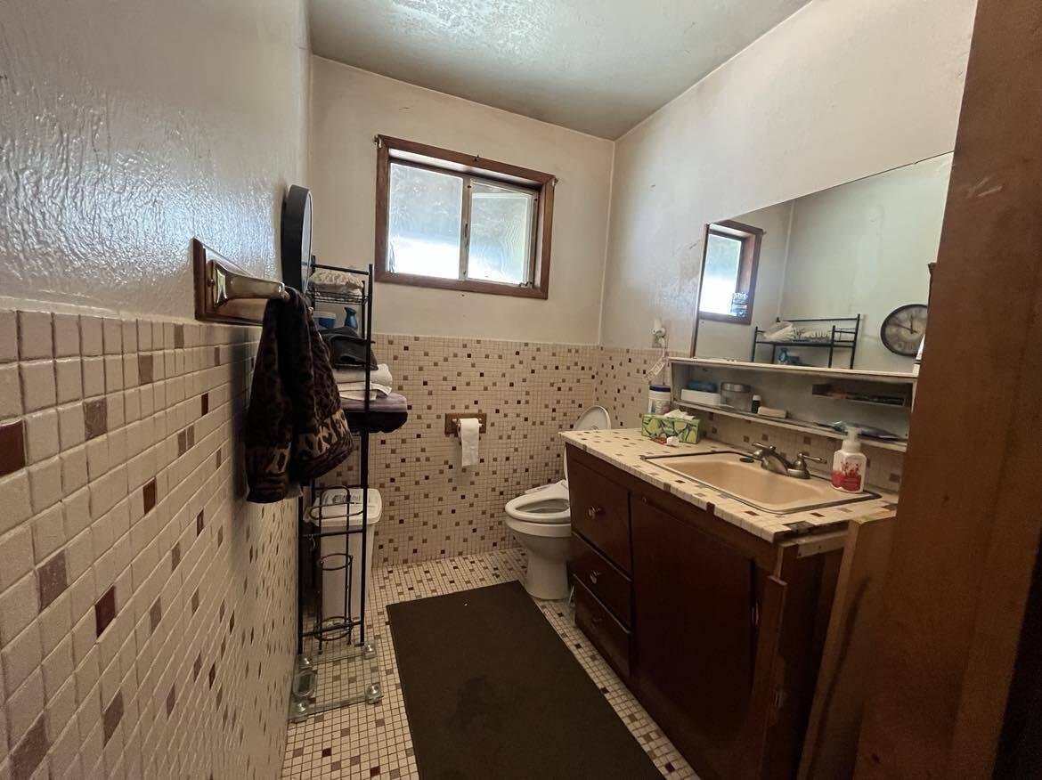 191 Henrietta Road Lewiston, CA 96052 - Photo 8 of 12 a bathroom with a toilet sink and mirror