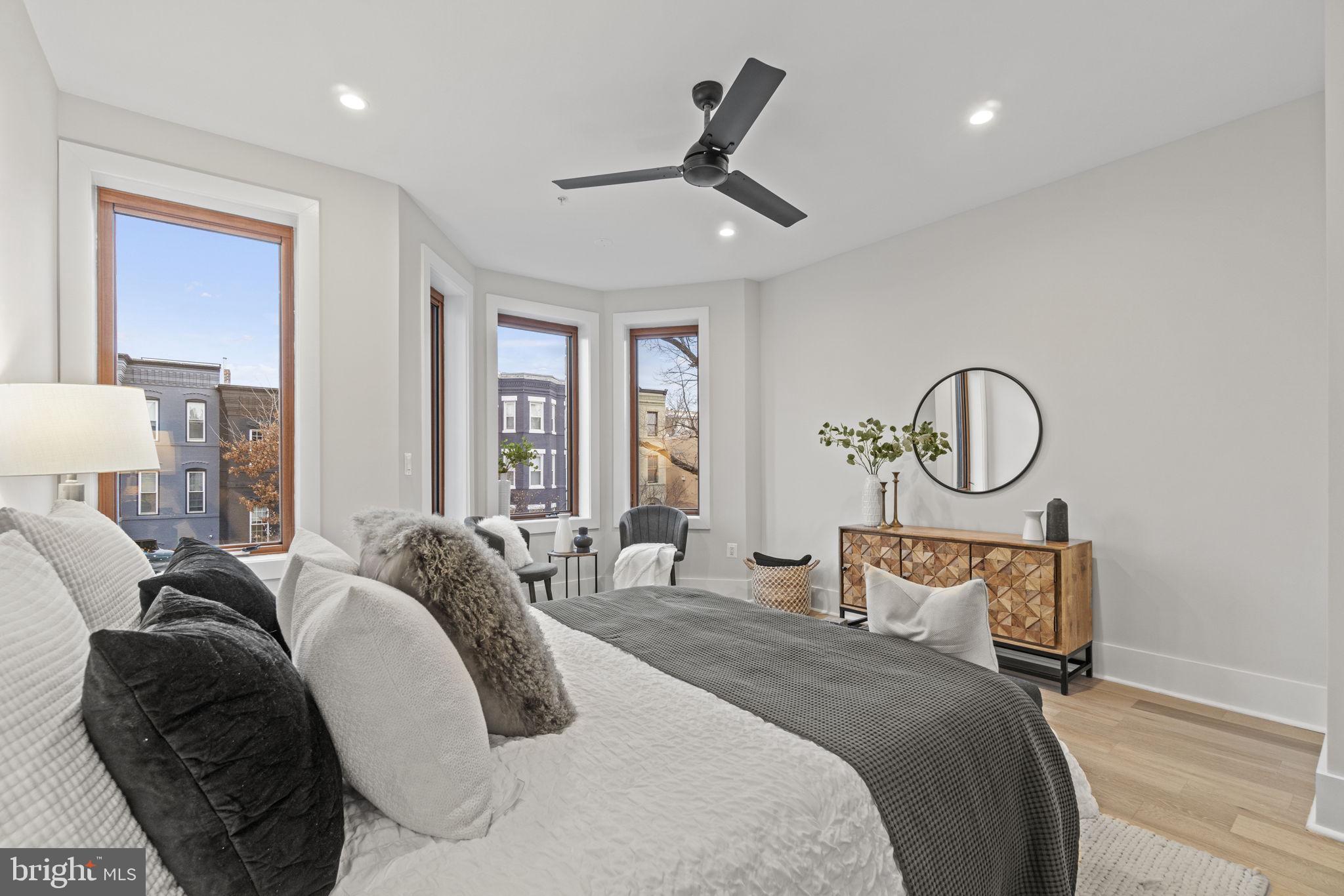 92 R Street Northwest Washington, DC 20001 - Photo 14 of 36 a bedroom with bed and a large window