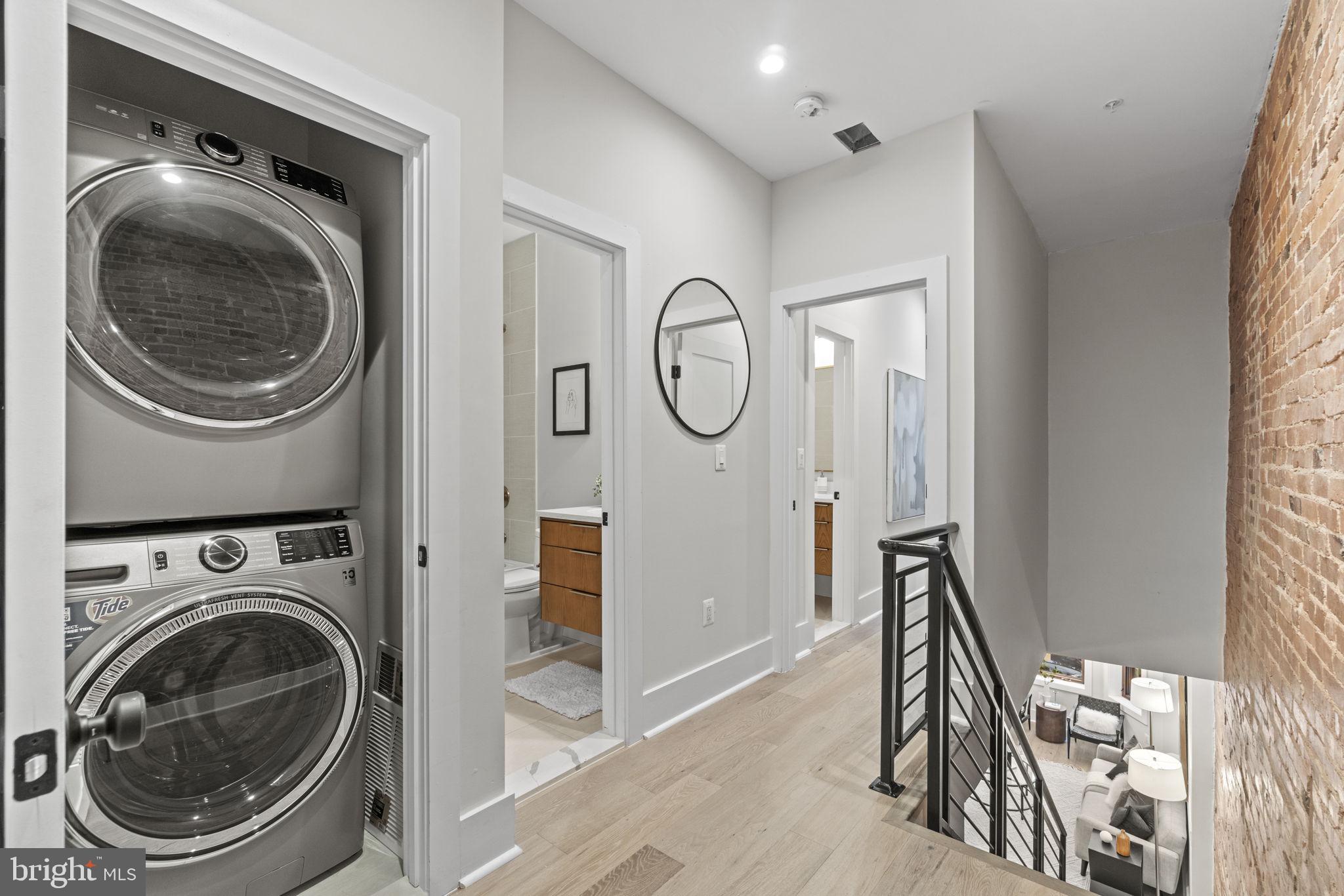92 R Street Northwest Washington, DC 20001 - Photo 20 of 36 a view of a hallway with washer and dryer