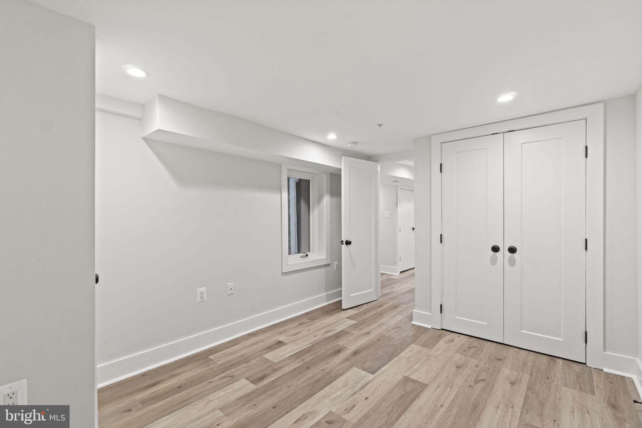92 R Street Northwest Washington, DC 20001 - Photo 28 of 36 a view of empty room with wooden floor
