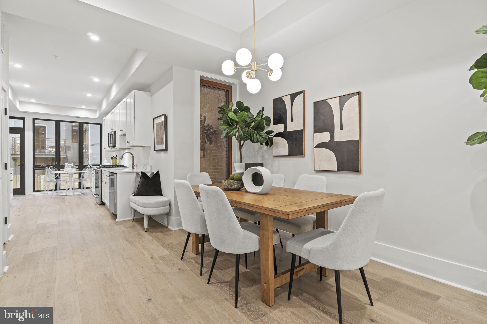92 R Street Northwest Washington, DC 20001 - Photo 6 of 36 a view of a dining room with furniture and wooden floor