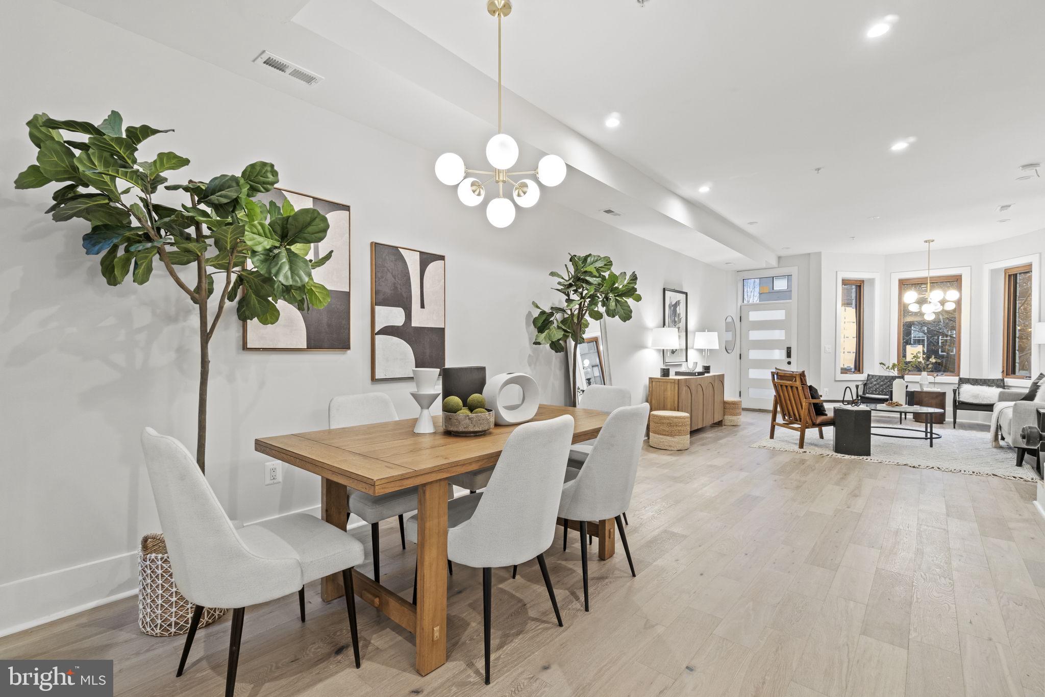 92 R Street Northwest Washington, DC 20001 - Photo 7 of 36 a view of a dining room with furniture and a chandelier