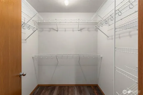 a view of a room with racks on the wall