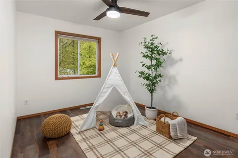 a room with furniture and a window