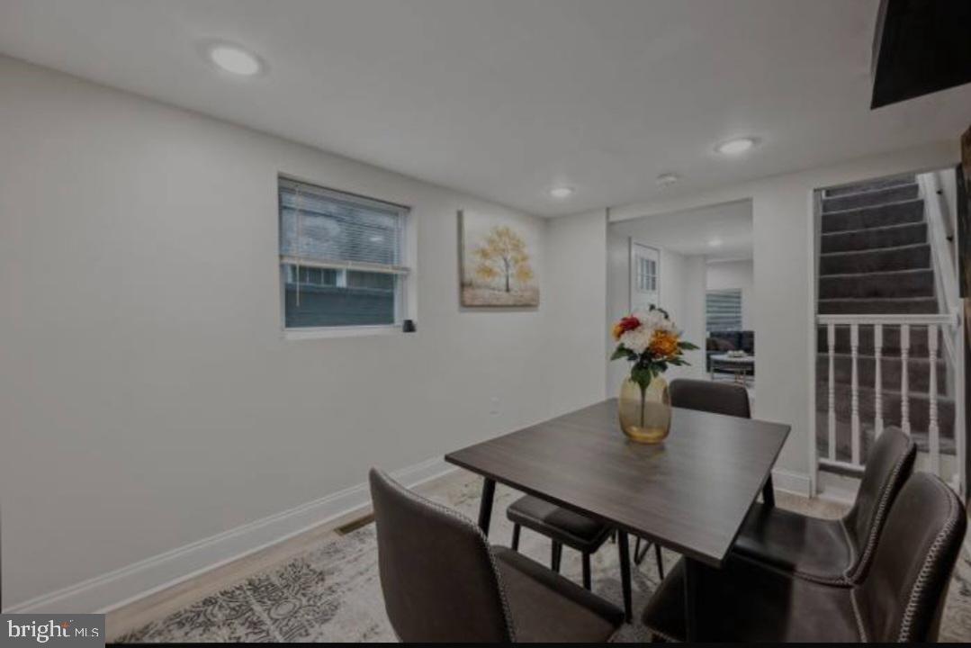 401 South Ann Street Baltimore, MD 21231 - Photo 21 of 30 a view of a dining room with furniture
