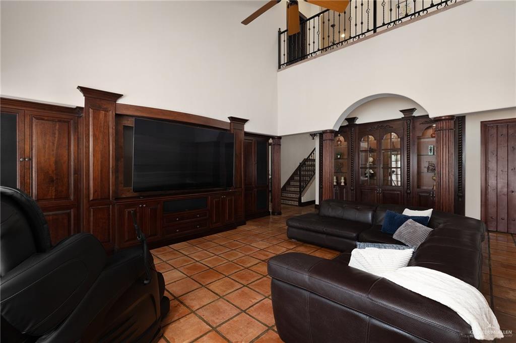 3506 Oak Ridge Lane Mission, TX 78573 - Photo 14 of 45 a living room with furniture and a flat screen tv