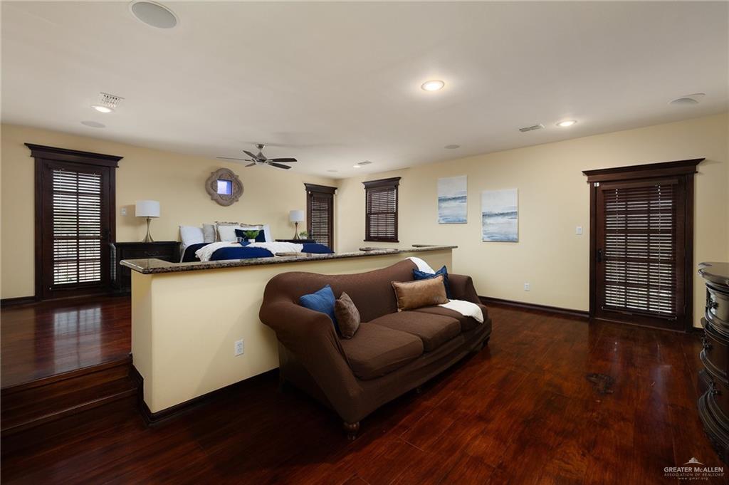 3506 Oak Ridge Lane Mission, TX 78573 - Photo 22 of 45 a living room with furniture and wooden floor