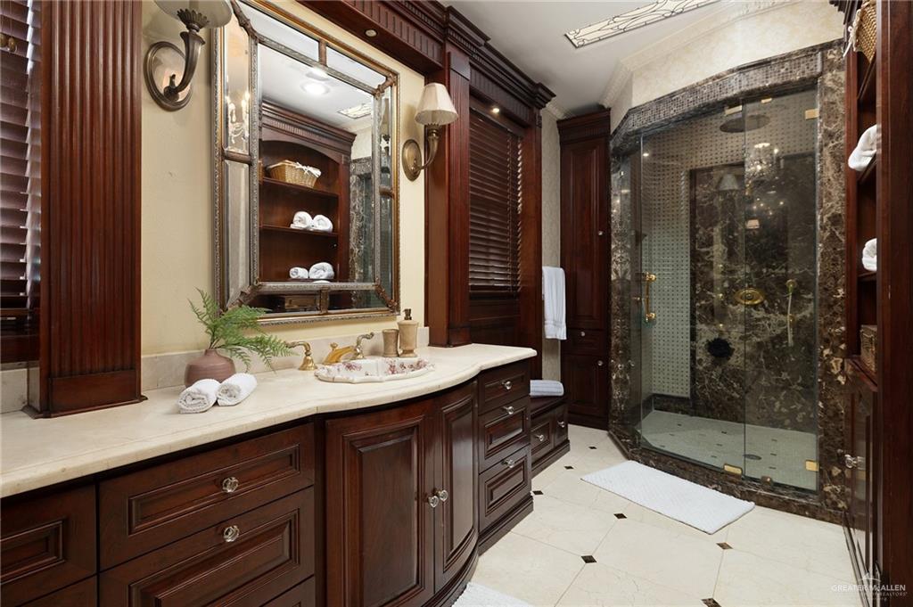 3506 Oak Ridge Lane Mission, TX 78573 - Photo 23 of 45 a bathroom with a sink and a mirror