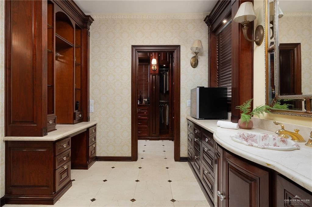 3506 Oak Ridge Lane Mission, TX 78573 - Photo 24 of 45 a bathroom with a sink a vanity and a mirror