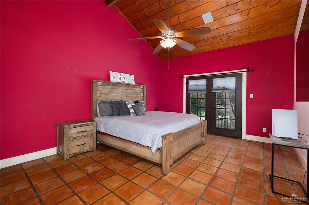 3506 Oak Ridge Lane Mission, TX 78573 - Photo 29 of 45 a bedroom with a bed and a mirror