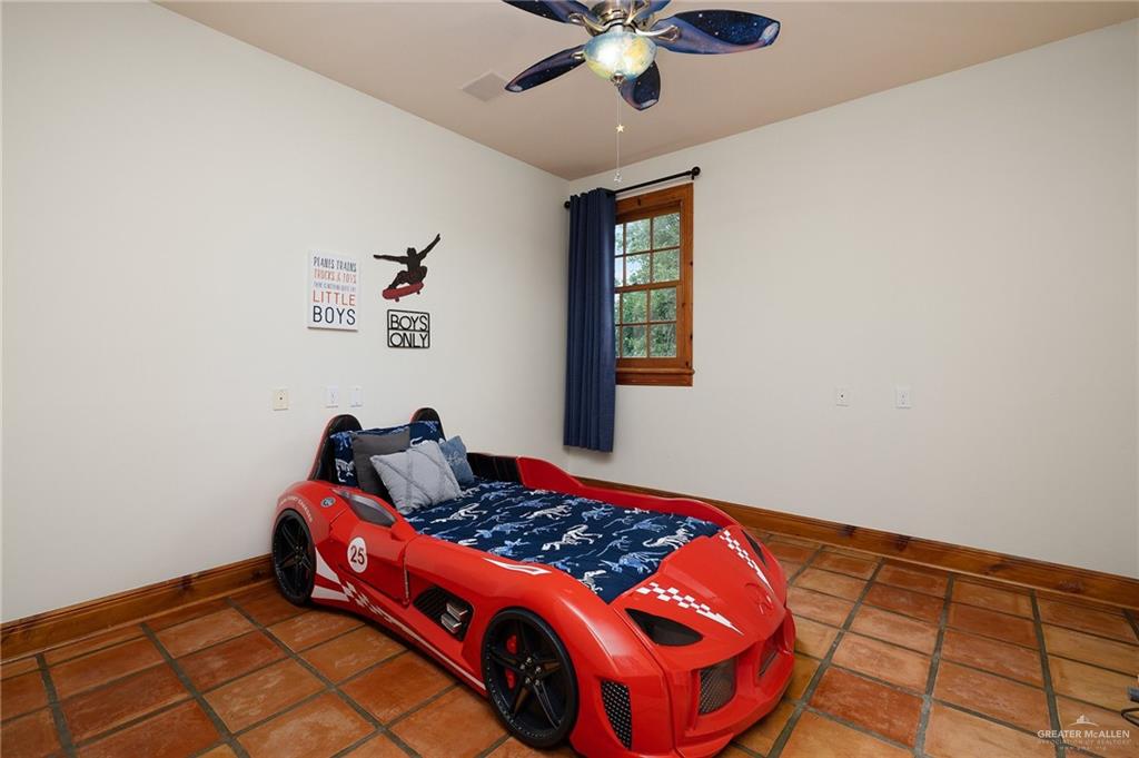 3506 Oak Ridge Lane Mission, TX 78573 - Photo 30 of 45 a bed room with a bed and a window