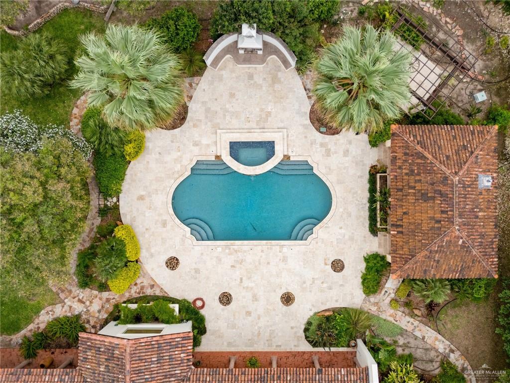 3506 Oak Ridge Lane Mission, TX 78573 - Photo 35 of 45 an aerial view of a house with a yard and trees all around