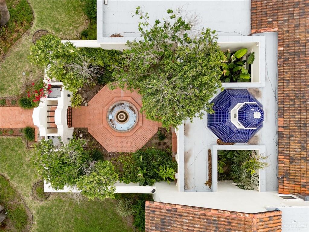 3506 Oak Ridge Lane Mission, TX 78573 - Photo 42 of 45 a view of a house with a garden and plants