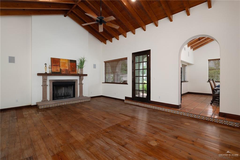 3506 Oak Ridge Lane Mission, TX 78573 - Photo 10 of 45 a view of empty room with wooden floor and fireplace