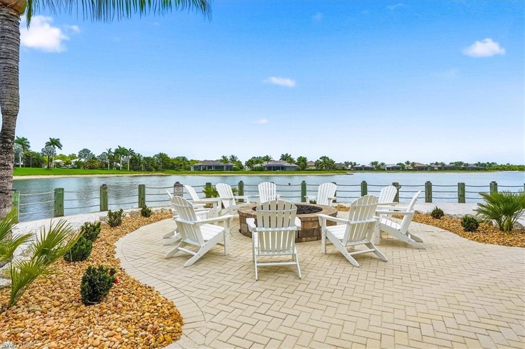 14318 Charthouse Circle Naples, FL 34114 - Photo 33 of 36 a view of a lake with furniture