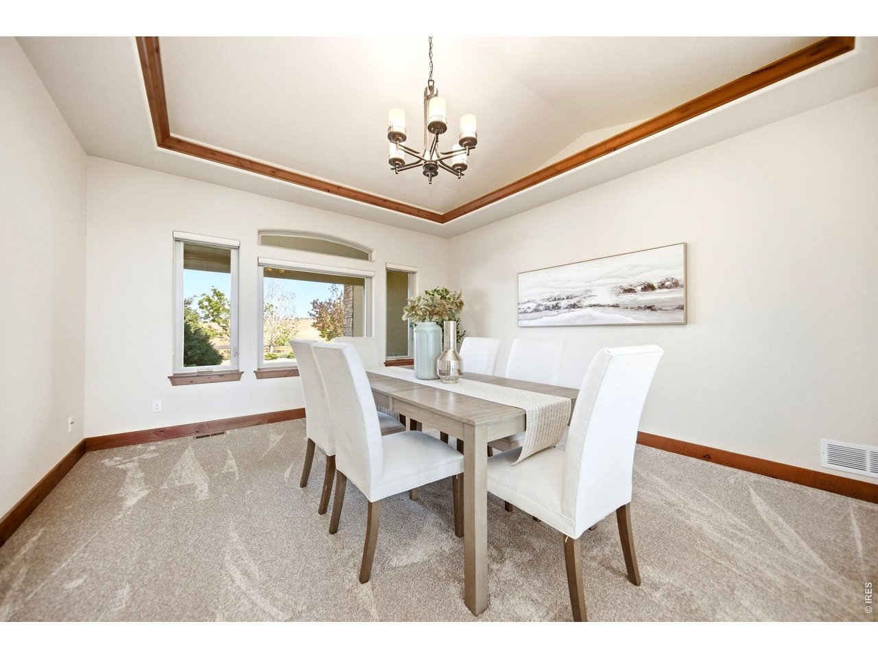 2153 Mountain River Road Berthoud, CO 80513 - Photo 14 of 50 Elegant formal dining room, complete with tray ceilings