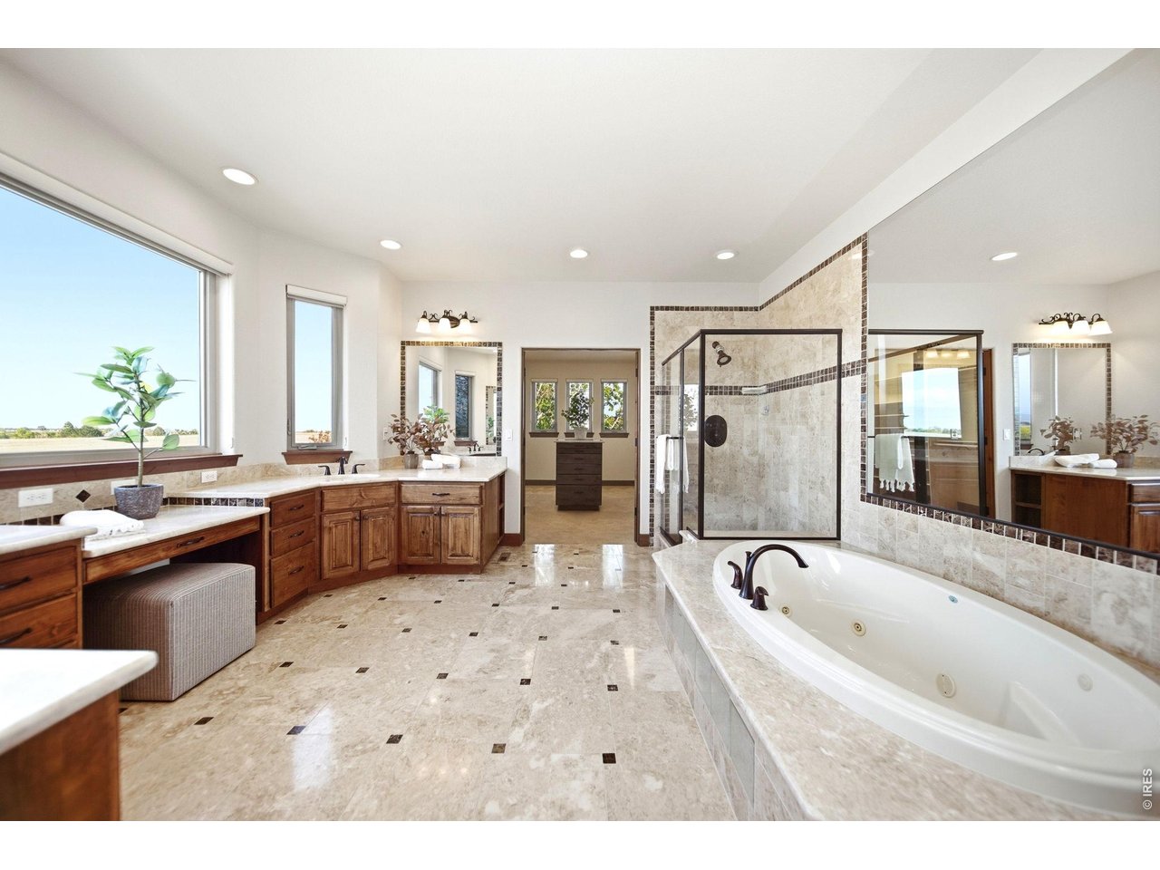 2153 Mountain River Road Berthoud, CO 80513 - Photo 20 of 50 Luxurious 5-piece bath with a soaking tub and dual vanities