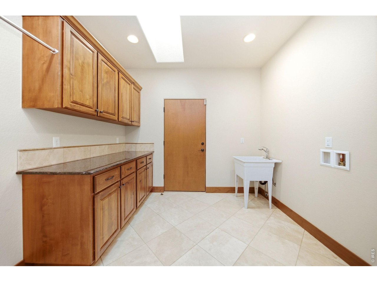 2153 Mountain River Road Berthoud, CO 80513 - Photo 26 of 50 Mudroom with sink and ample storage