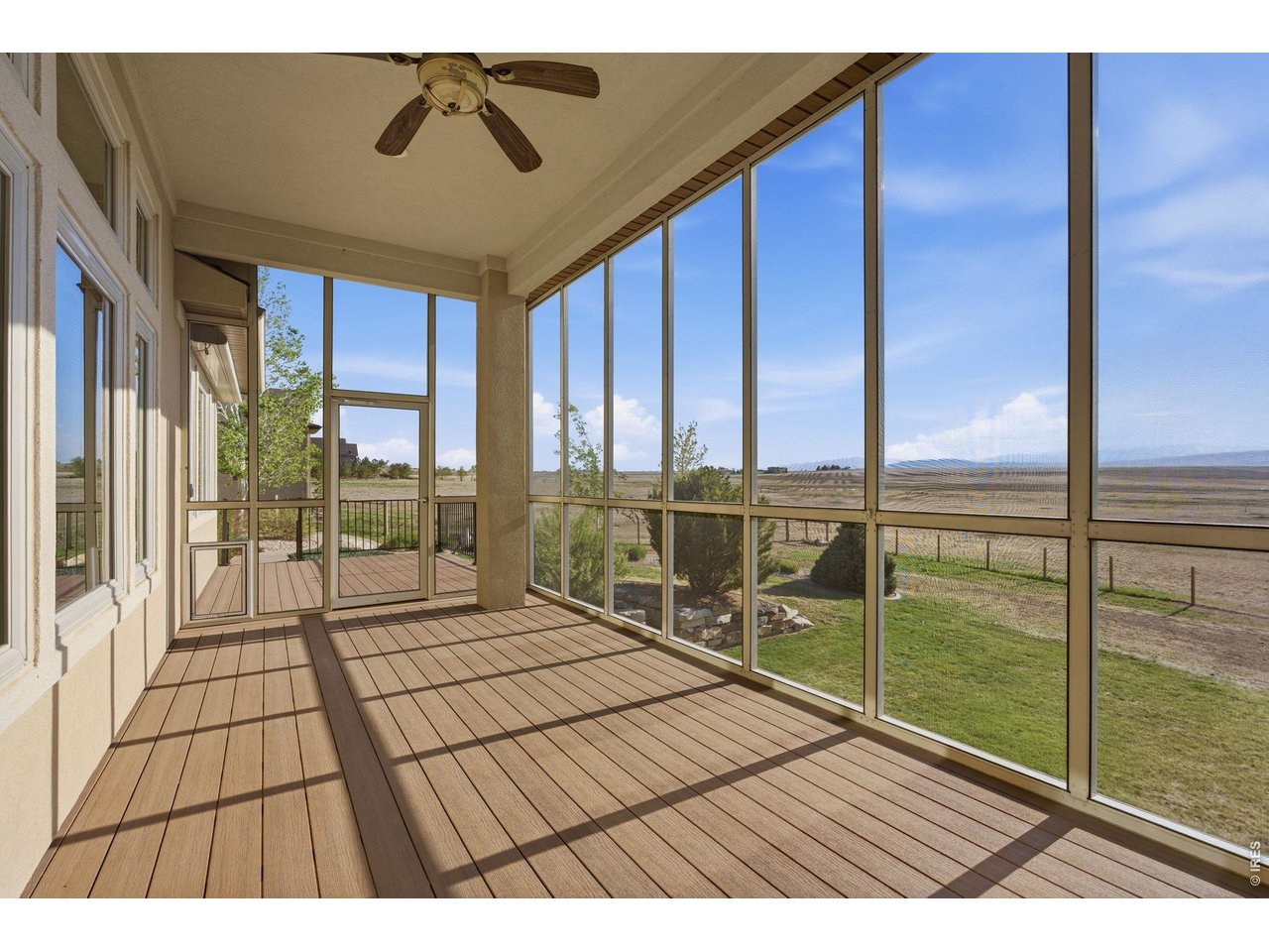 2153 Mountain River Road Berthoud, CO 80513 - Photo 37 of 50 Screened-in porch with mountain views for days