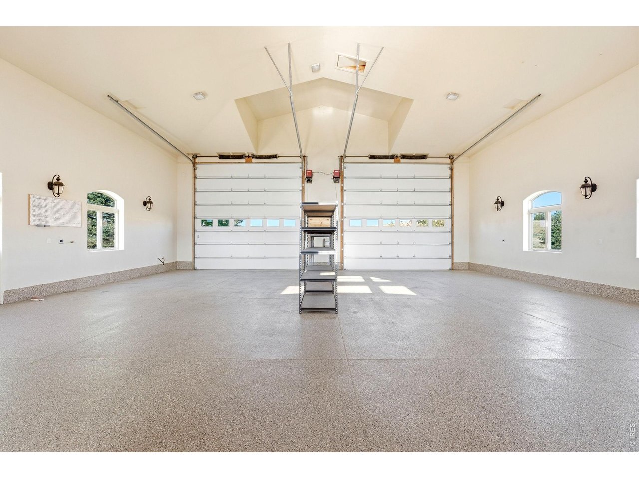2153 Mountain River Road Berthoud, CO 80513 - Photo 42 of 50 Complete with mezzanine 3/4 bath and 14'x14' overhead doors